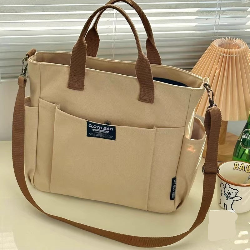 Lightweight canvas tote shoulder and crossbody bag in a casual style