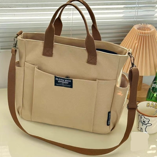 Lightweight canvas tote shoulder and crossbody bag in a casual style