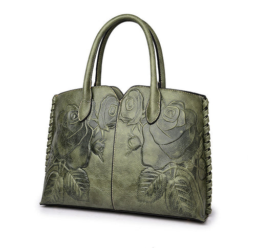 Red PU handbag featuring a raised peony flower pattern