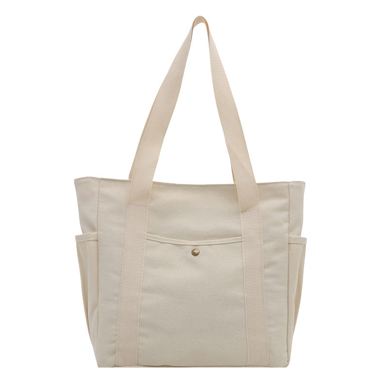 Women's large-capacity canvas tote bag with a casual minimalist design