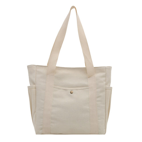 Women's large-capacity canvas tote bag with a casual minimalist design
