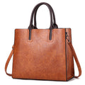 Women's large PU leather handbag with a plain casual design