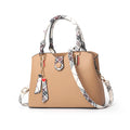 Women's medium PU leather Boston handbag with a structured square shape
